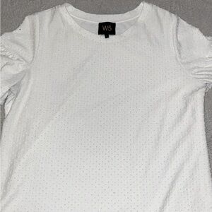 This is a pearl white dress shirt with a beautiful lace around the sleeves!